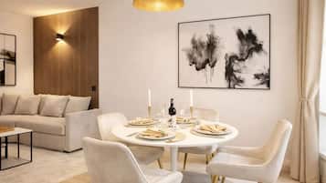 Superior Apartment, City View | Living area | 80-cm Smart TV with digital channels