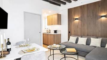 Studio, Courtyard View | Living area | 80-cm Smart TV with digital channels