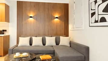 Studio, vue cour intérieure | Coin séjour | TV connectée de 80 cm avec chaînes numériques