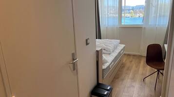 1 bedroom, laptop workspace, iron/ironing board, bed sheets