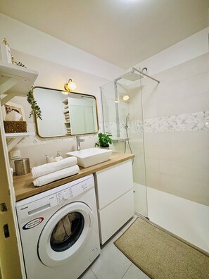 Hair dryer, towels, soap, shampoo