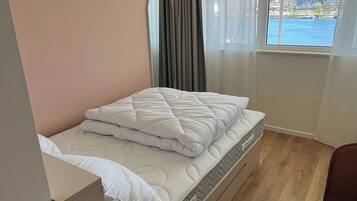 1 bedroom, laptop workspace, iron/ironing board, bed sheets