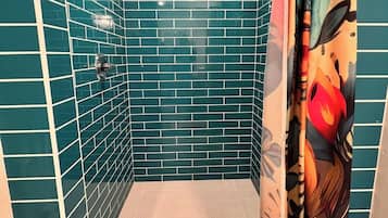 Shower, towels, soap, toilet paper