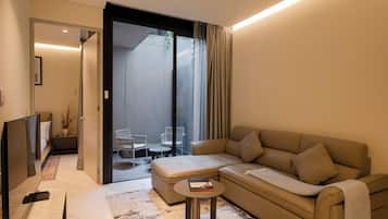 Executive-huoneisto, 1 makuuhuone, patio | Oleskelualue