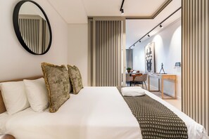 1 chambre, coffres-forts dans les chambres, fer et planche à repasser
