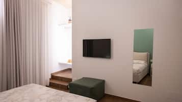 Habitación Deluxe, balcón | Wifi gratis y ropa de cama