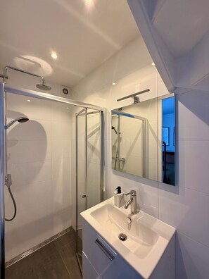 Hair dryer, towels, soap, shampoo