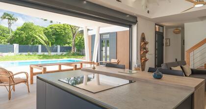 Villa Kassav beautiful garden aperitif area and mirror pool close to the beach