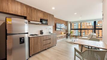 Design Loft, City View | Private kitchen | Full-sized fridge, stovetop, coffee/tea maker, blender
