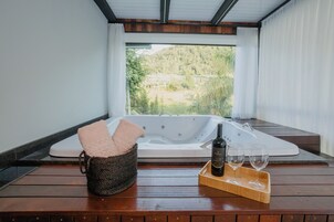 Chalé romântico | Banheira de hidromassagem particular