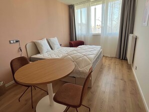 1 bedroom, laptop workspace, iron/ironing board, bed sheets