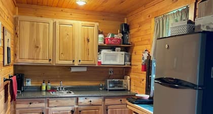 Charming Rustic Cottage in the Heart of Laurel Highlands, PA <br>Escape to this cozy, rustic retreat nestled in the stunning Laurel Highlands of Pennsylvania & Deer Creek Winery, where nature meets comfort & taste. Perfect for a weekend getaway or a