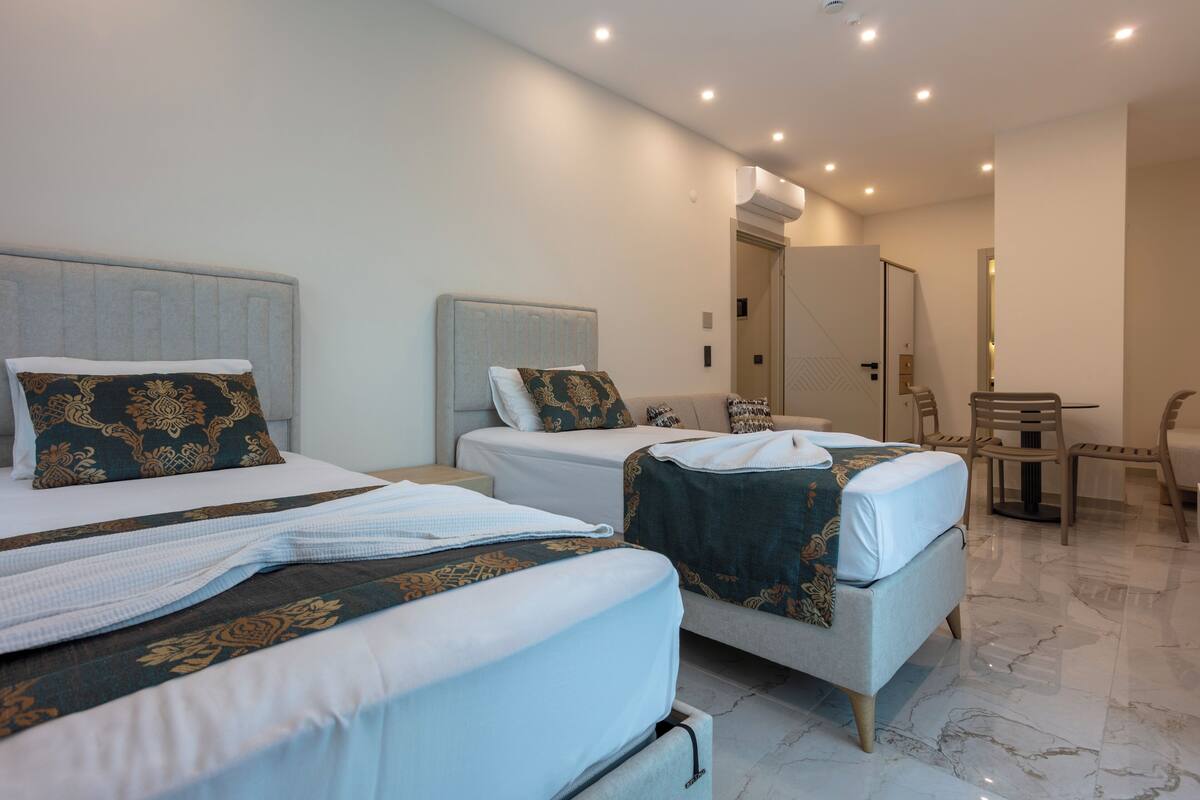 Laptop workspace, free cots/infant beds, free WiFi, bed sheets