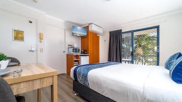 1 habitación, tabla de planchar con plancha, wifi gratis y ropa de cama