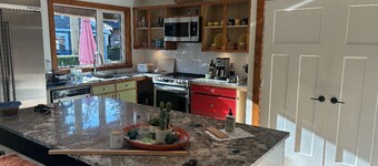 Beautifully updated cottage steps from the lake.