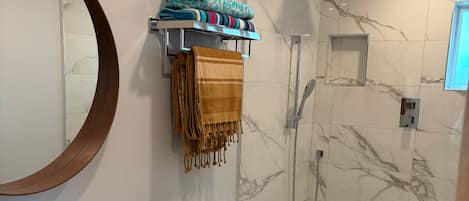 Shower, towels, toilet paper