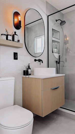 Shower, hair dryer, towels, soap