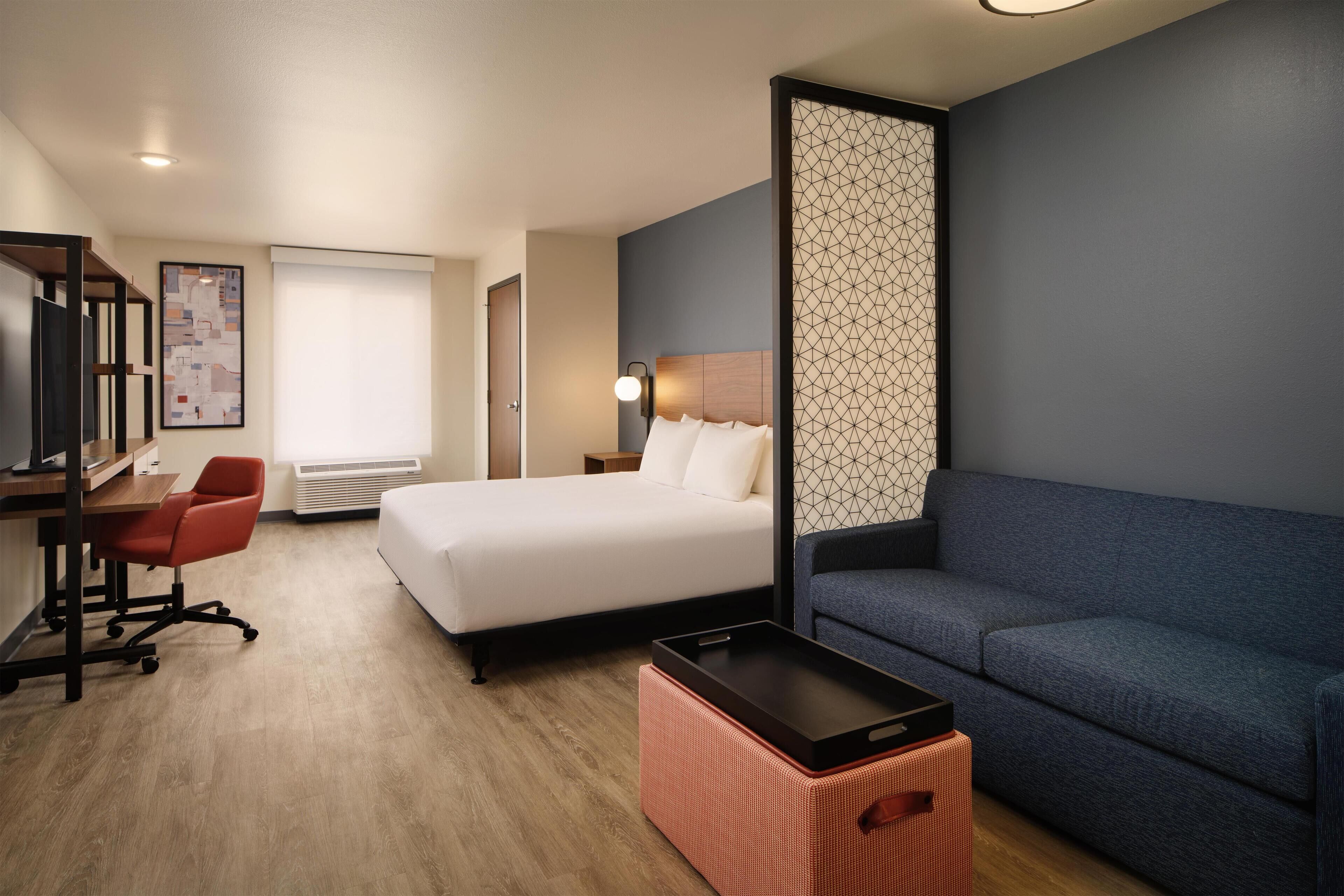 Suite Studio, 1 très grand lit, baignoire accessible aux personnes à mobilité réduite