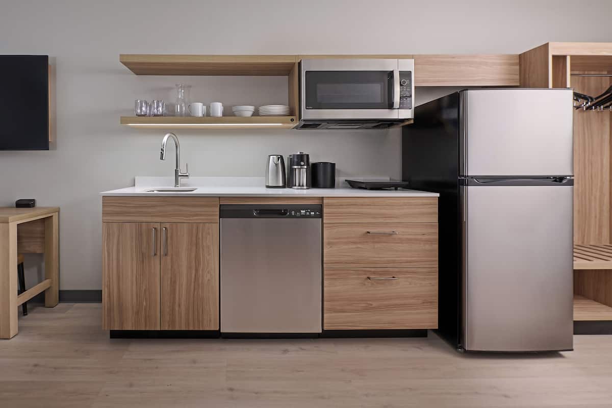 Hypo-allergenic bedding, desk, laptop workspace, blackout curtains