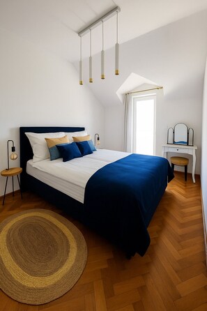 2 slaapkamers, een strijkplank/strijkijzer, gratis wifi, beddengoed