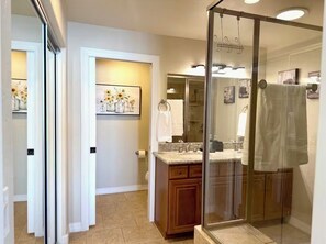 Shower, hair dryer, towels, soap