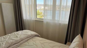 Appartamento | 1 camera, postazione laptop, ferro/asse da stiro, lenzuola