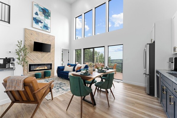 Smart TV, fireplace, books, stereo