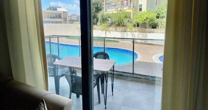 Stylish 1BR Flat Pool View & 10 min Walk to Beach