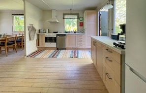 Fridge, stovetop, dishwasher, coffee/tea maker