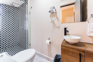 Hair dryer, towels, toilet paper