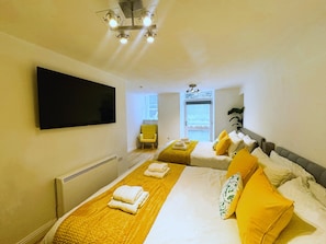 1 chambre, fer et planche à repasser, Wi-Fi gratuit, draps fournis