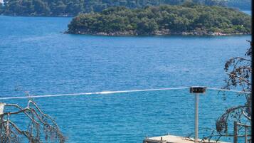 Duplex luxo, vista para o mar | Terraço/pátio