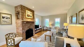 Smart TV, fireplace, table tennis, books