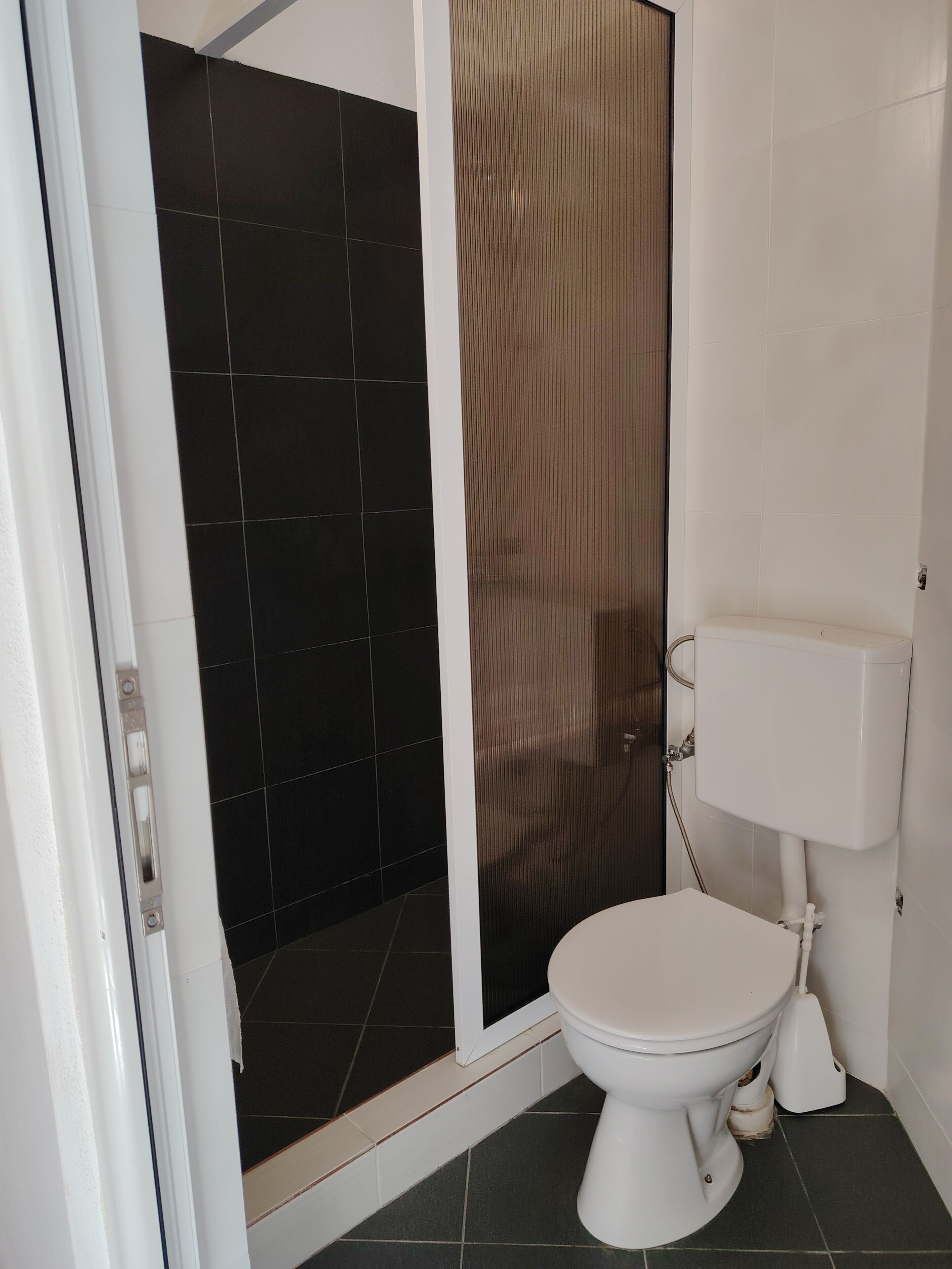 Dutxa, tovalloles, sabó i xampú 