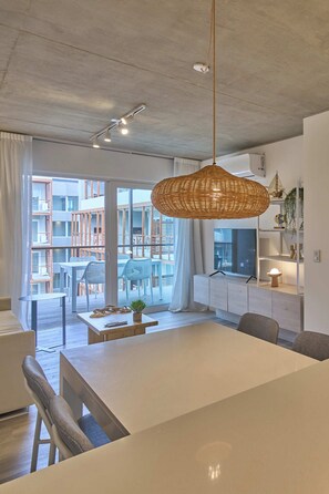 Apartment, Partial Sea View | Living area - Almarena La Reserva (Costa del Este)