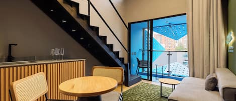 Grand Studio | Living area | 55-inch Smart TV with cable channels