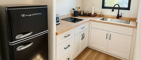 Fridge, microwave, stovetop, coffee/tea maker
