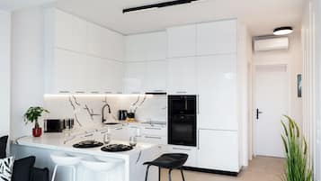 Luxury Apartment, Sea View, Poolside | Private kitchen | Full-sized fridge, microwave, oven, stovetop