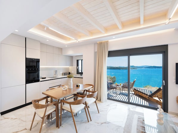 Luxury Duplex, Sea View | Private kitchen | Full-size fridge, microwave, oven, stovetop