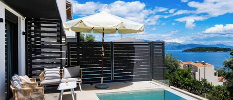 Luxury Apartment, Sea View, Poolside | Terrace/patio