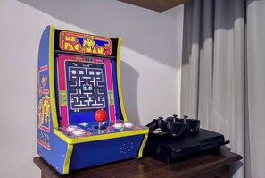 A vintage arcade machine with a maze game, joystick, and buttons on a wooden surface. - NEW Listing 🔥 Hot Tub • Mountain View • Fire Pit • EV Charger (Sevierville)
