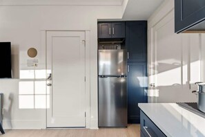 Fridge, microwave, cookware/dishes/utensils