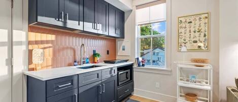 Fridge, microwave, cookware/dishes/utensils