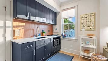 Fridge, microwave, cookware/dishes/utensils