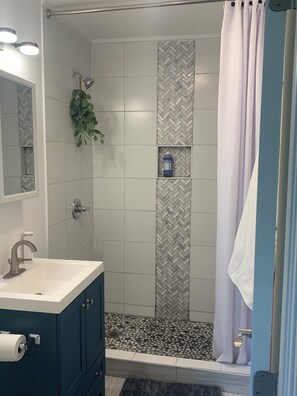 Hair dryer, towels, soap, toilet paper