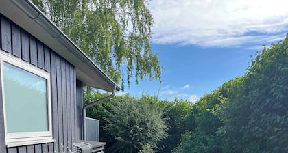 Front-row summerhouse with view and big garden