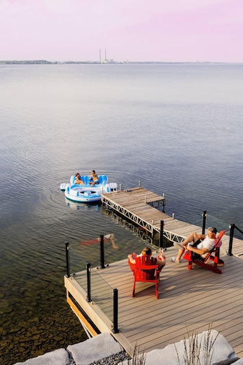 Image of PEC Lakeside Cottage | Hot Tub, Modern Comforts & Year-Round Escape