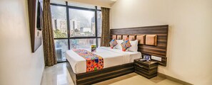Deluxe Room | Egyptian cotton sheets, premium bedding, in-room safe, free WiFi - Fabexpress Konak (Mumbai)