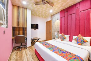 Deluxe kamer | Lakens van Egyptisch katoen, luxe beddengoed, een kluis op de kamer