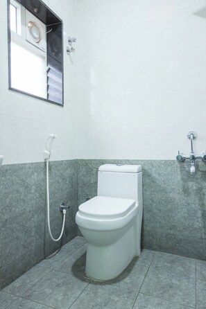 Deluxe Room | Bathroom | Shower, rainfall showerhead, free toiletries, towels - FabHotel Golden Comforts (Bengaluru)